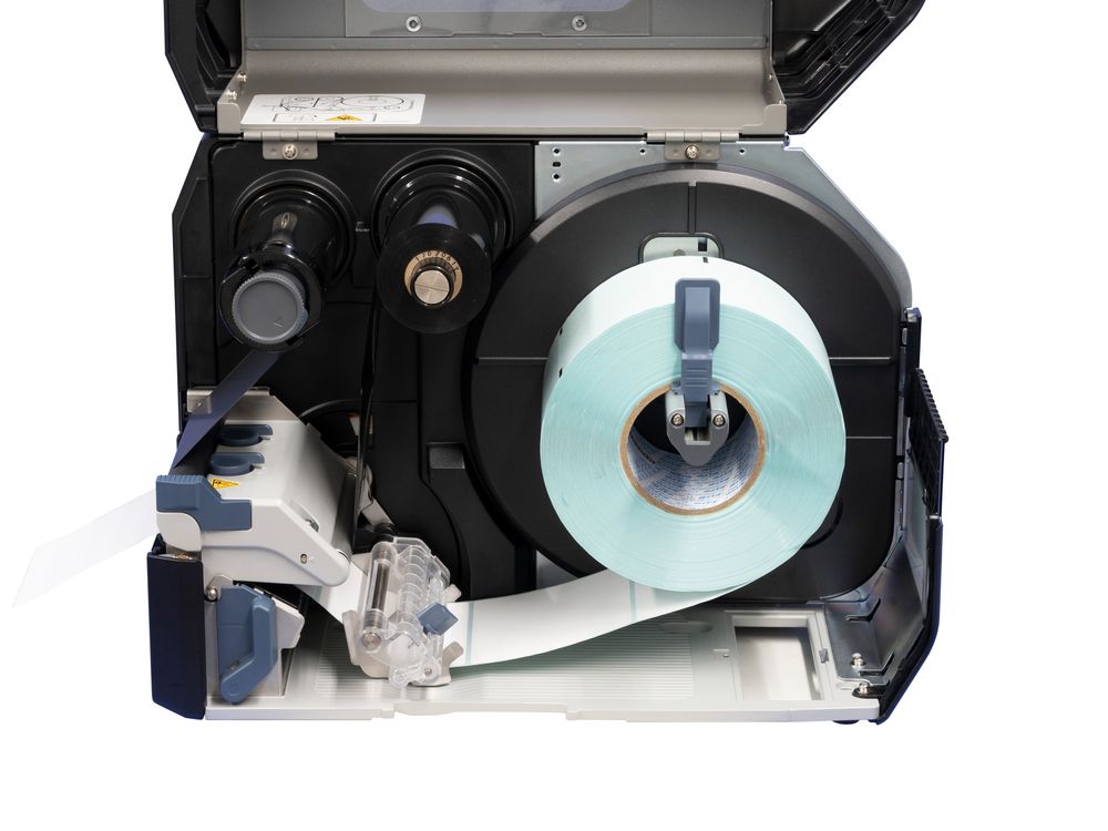 Sato CL4NX Plus Etikettendrucker offen mit eingelegter Etikettenrolle