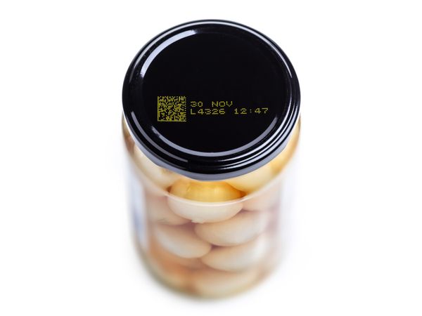 CIJ yellow ink on glass bottle