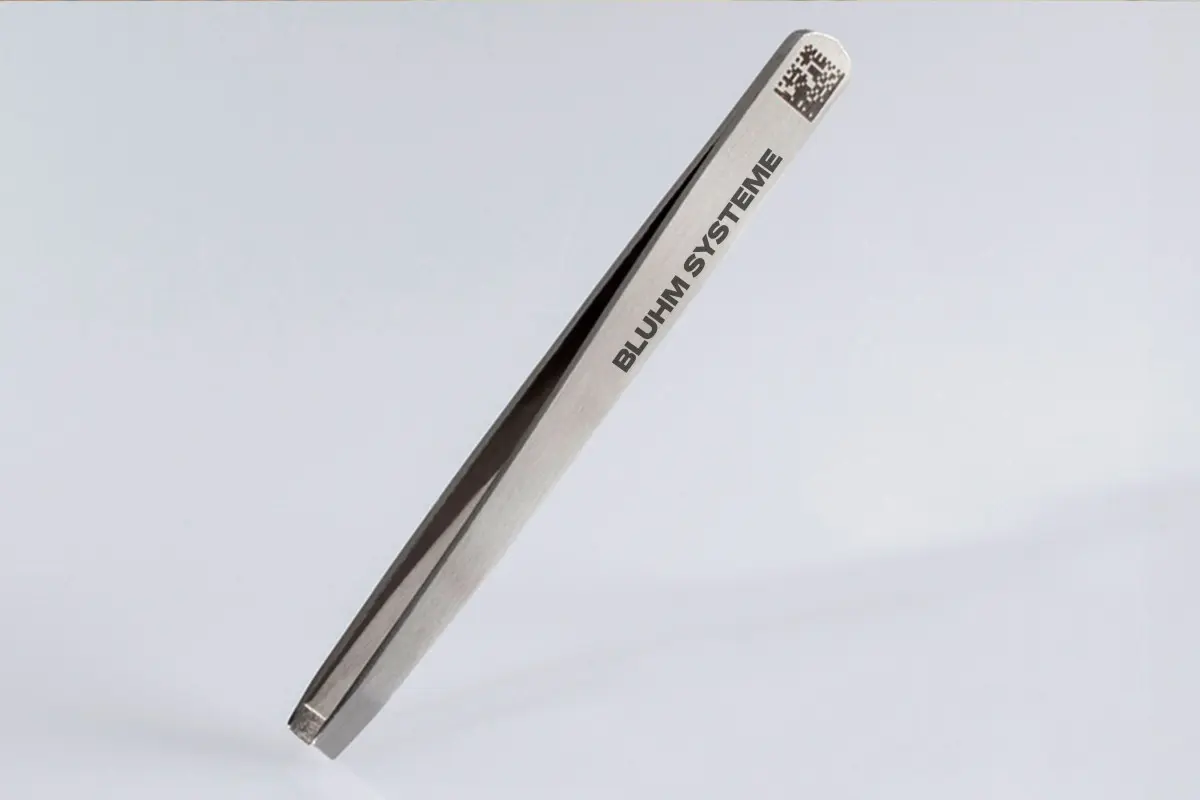 Laser marking on metal tweezers